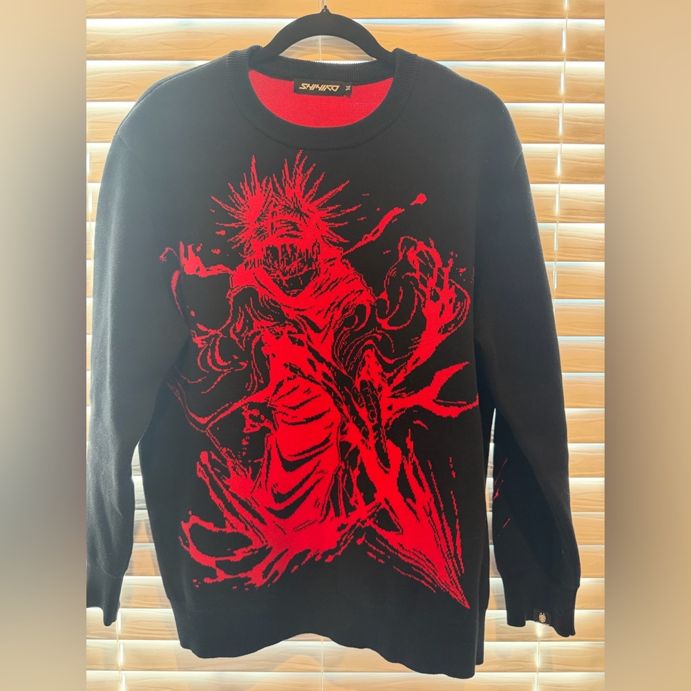 Black Sweater with Red Graphic Design